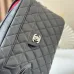 Chic Black Chanel Quilted Bag With Signature Logo Accent For Timeless Luxury #A49788