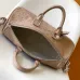 Elegant Beige Louis Vuitton Embossed Leather Speedy Bag For Timeless Luxury Travel And Style #A49952
