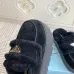 Prada Women's Shearling Lined Mule Slippers Triangle Logo Thick Sole Design for Cozy Luxury Winter Footwear #A57764